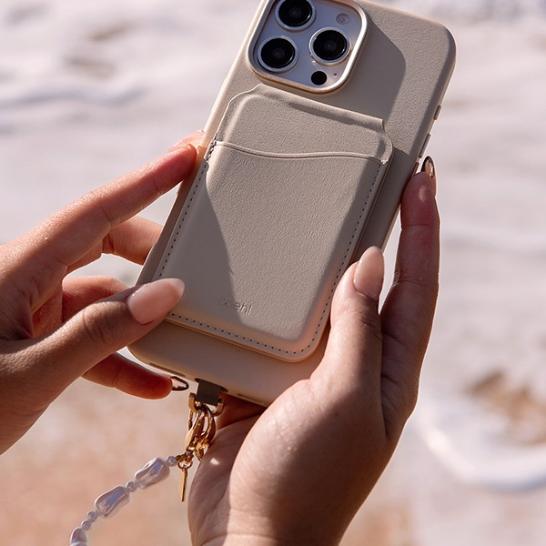 UNIQ Coehl Perla Handstrap uniwersalny   sznurek do telefonu na rękę biały/white pearl