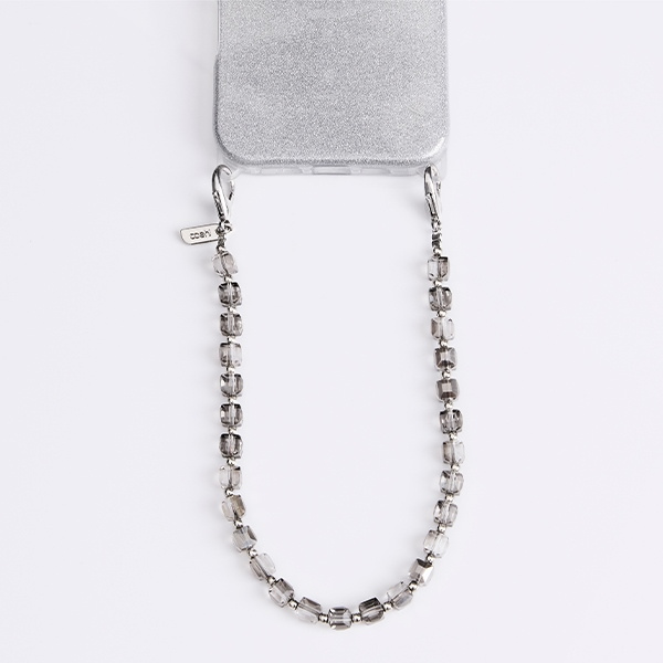 UNIQ Coehl Candy Gem Handstrap           uniwersalny sznurek do telefonu na rękę srebrny/silver sparkling